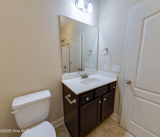 5225 National Garden Trl, Winnabow, NC 28479 - bathroom featuring toilet, tile patterned floors, baseboards, and vanity