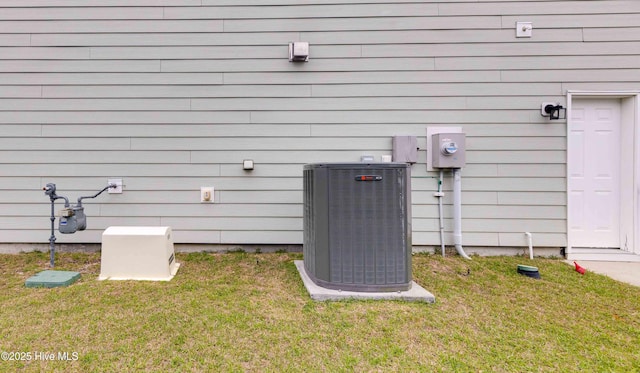 5225 National Garden Trl, Winnabow, NC 28479 - exterior details with central AC unit and electric meter