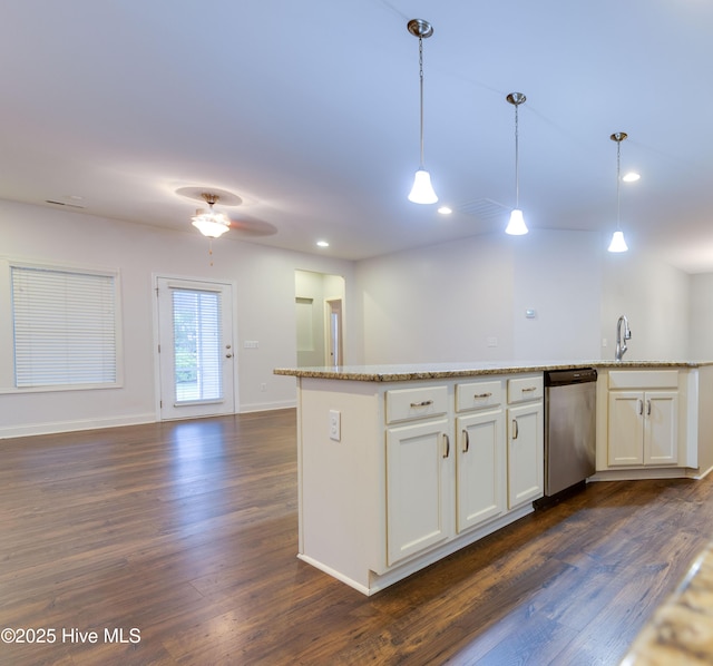 5225 National Garden Trl, Winnabow, NC 28479 - kitchen featuring open floor plan, dark wood-style floors, white cabinetry, dishwasher, and decorative light fixtures