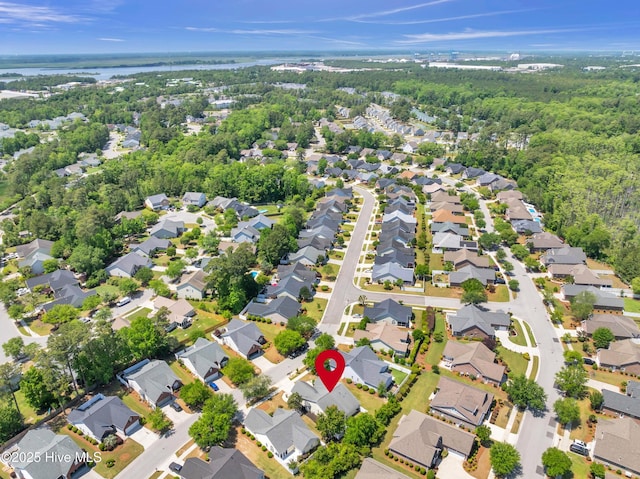 birds eye view of property with a residential view