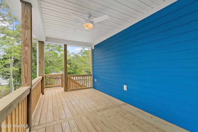 226 NE 64th St, Oak Island, NC 28465 - deck with a ceiling fan