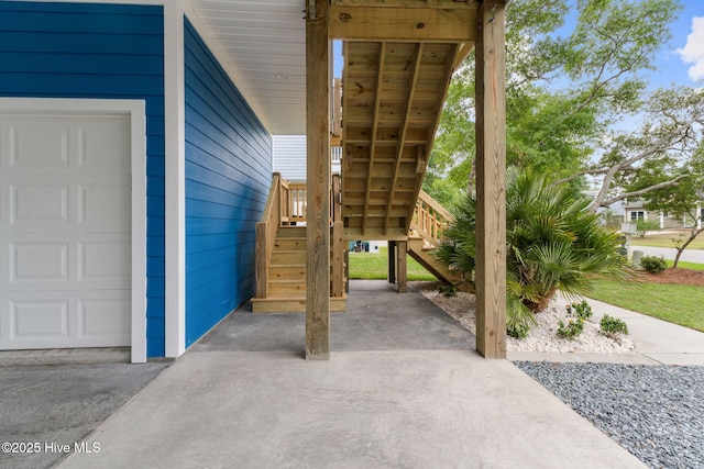 226 NE 64th St, Oak Island, NC 28465 - view of patio / terrace with stairway