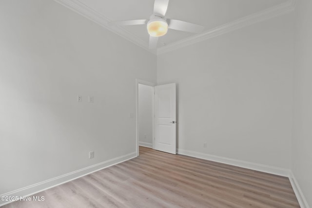226 NE 64th St, Oak Island, NC 28465 - empty room featuring ornamental molding, light wood-style floors, baseboards, and ceiling fan