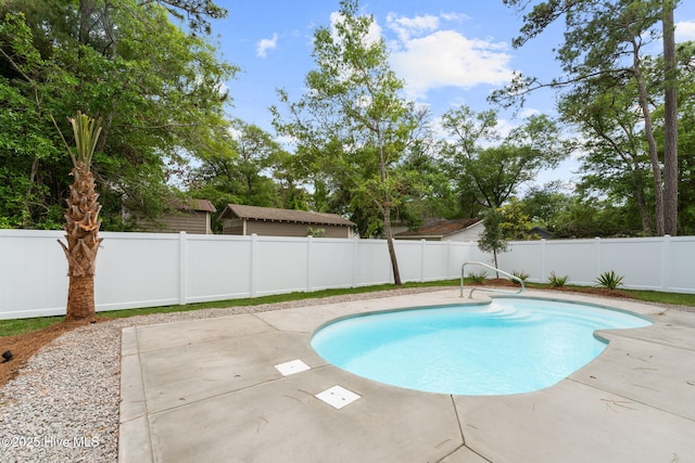 226 NE 64th St, Oak Island, NC 28465 - view of swimming pool with a fenced backyard and a patio