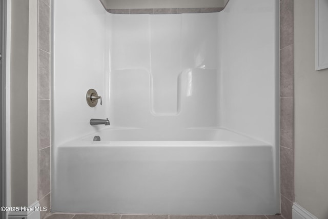 full bathroom with washtub / shower combination