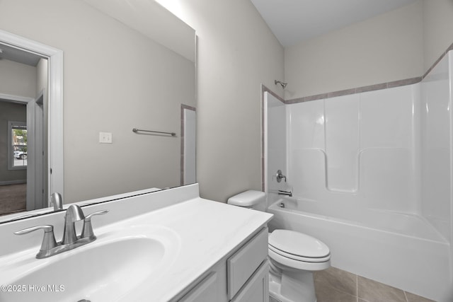 full bathroom featuring toilet,  shower combination, tile patterned floors, and vanity