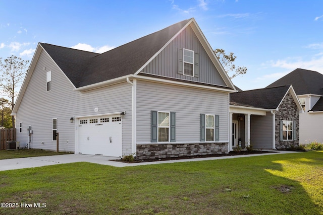 craftsman inspired home with board and batten siding, cooling unit, stone siding, and a front yard