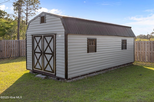 view of shed featuring a fenced backyard