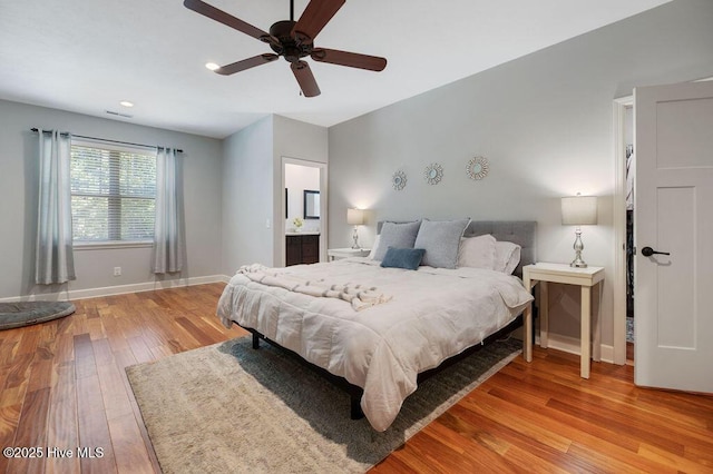 bedroom featuring visible vents, baseboards, recessed lighting, a ceiling fan, and light wood-style flooring