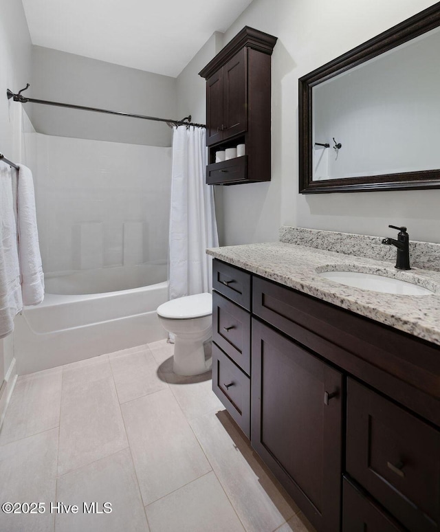 full bath with vanity, shower / tub combo with curtain, tile patterned flooring, and toilet