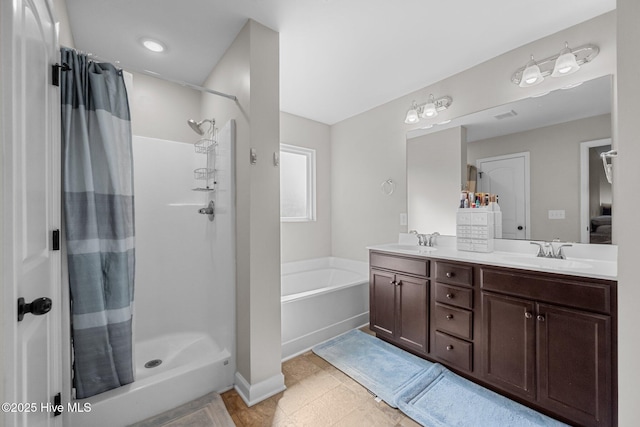 full bathroom featuring double vanity, a sink, a bath, and a stall shower