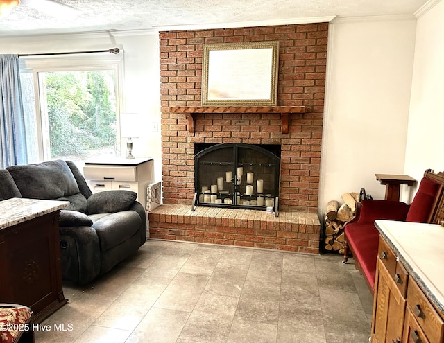 living area featuring crown molding and a fireplace