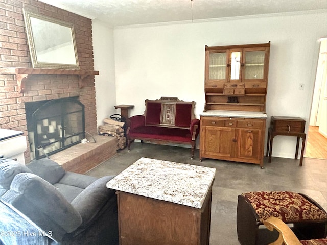 living room with ornamental molding, a fireplace, and a textured ceiling