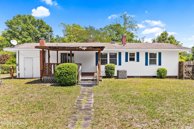 814 Latimer Dr, Wilmington, NC 28403 - view of front of property featuring cooling unit and a chimney