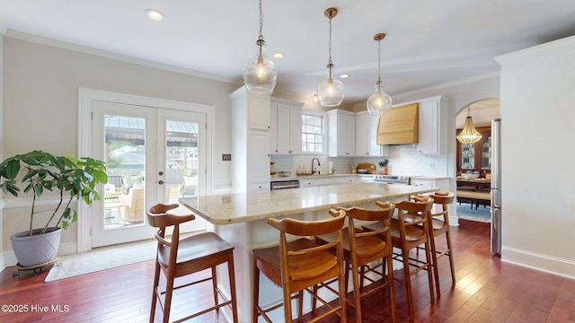 kitchen with french doors, premium range hood, recessed lighting, decorative backsplash, and dark wood-style floors