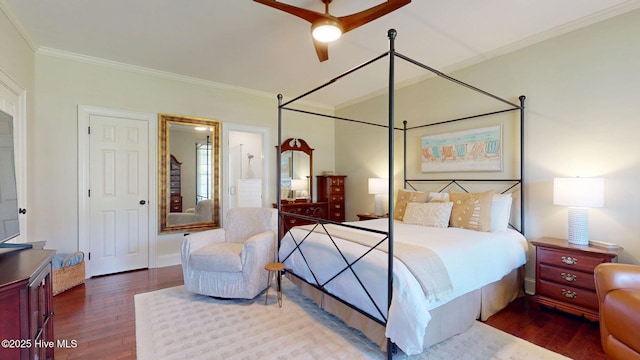 bedroom featuring ornamental molding and wood finished floors