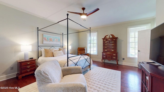 bedroom featuring crown molding, baseboards, ceiling fan, and hardwood / wood-style flooring