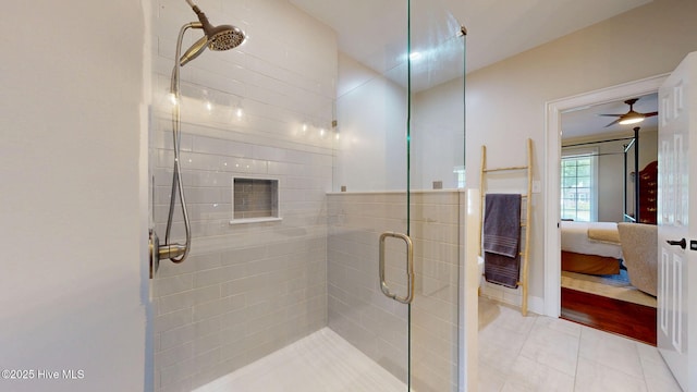 full bathroom with tile patterned floors, ensuite bath, and a shower stall