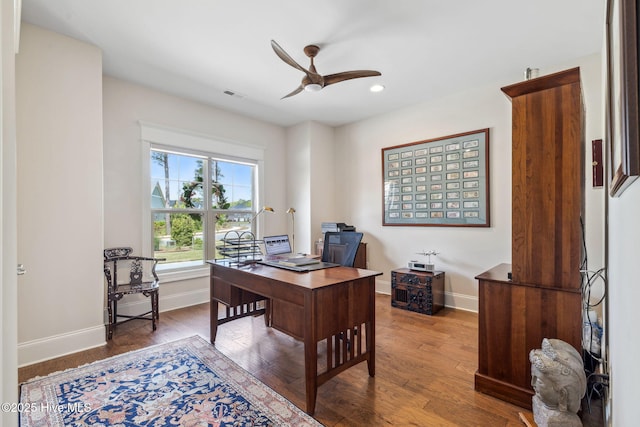 home office featuring baseboards, recessed lighting, ceiling fan, and wood finished floors