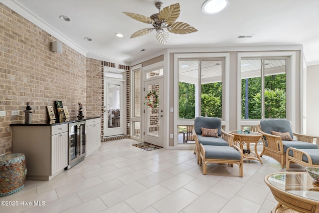 interior space featuring beverage cooler, visible vents, light tile patterned flooring, and brick wall