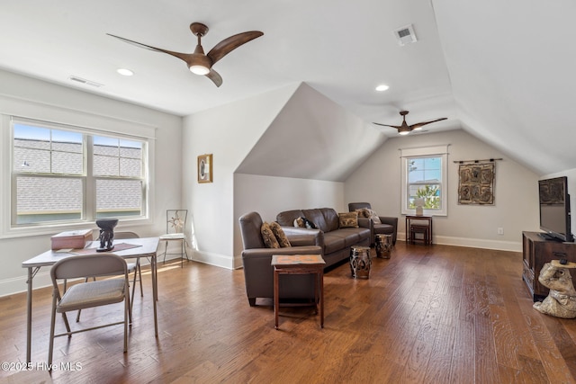 interior space with ceiling fan, dark wood-style flooring, and visible vents