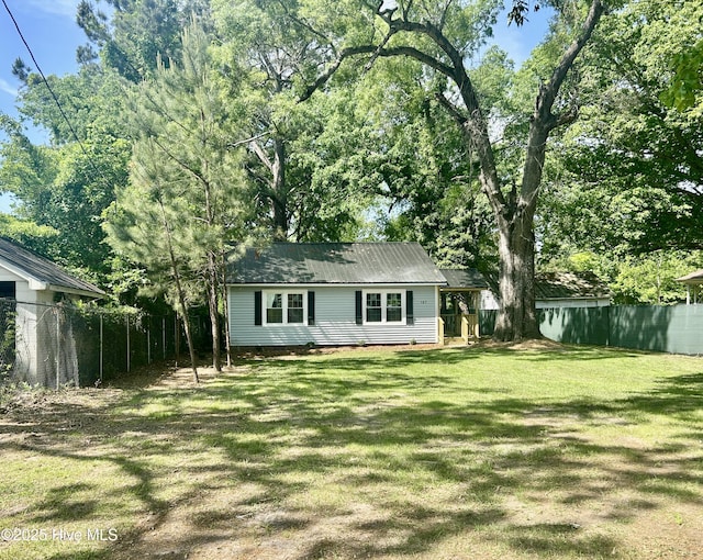 107 S Outerbridge St, Robersonville, NC 27871 - exterior space with fence and a lawn