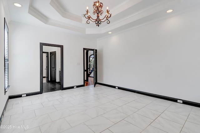 unfurnished room featuring crown molding, a raised ceiling, recessed lighting, and a chandelier