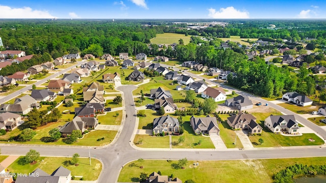 birds eye view of property with a residential view