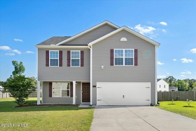 view of front of home with an attached garage, a front lawn, fence, and driveway