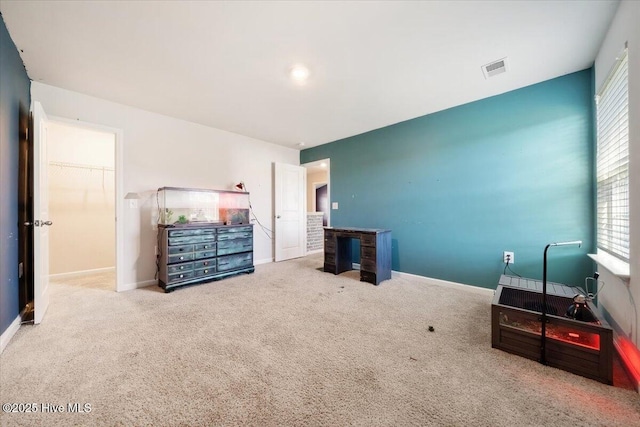 bedroom featuring baseboards, carpet, and visible vents