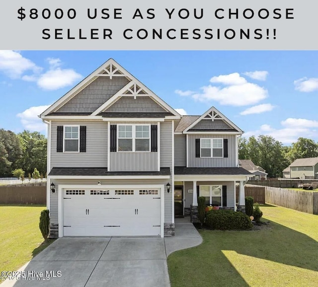 220 Rustic Field Dr, Goldsboro, NC 27530 - craftsman inspired home with driveway, a garage, board and batten siding, stone siding, and covered porch