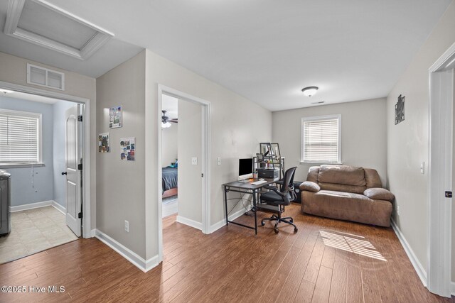 220 Rustic Field Dr, Goldsboro, NC 27530 - home office featuring attic access, wood finished floors, and baseboards