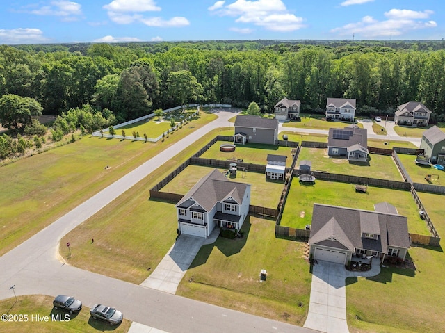 bird's eye view with a view of trees