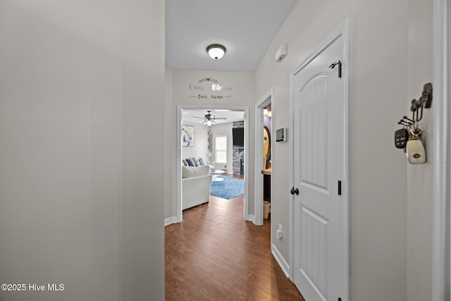 220 Rustic Field Dr, Goldsboro, NC 27530 - hall with dark wood-style flooring and baseboards