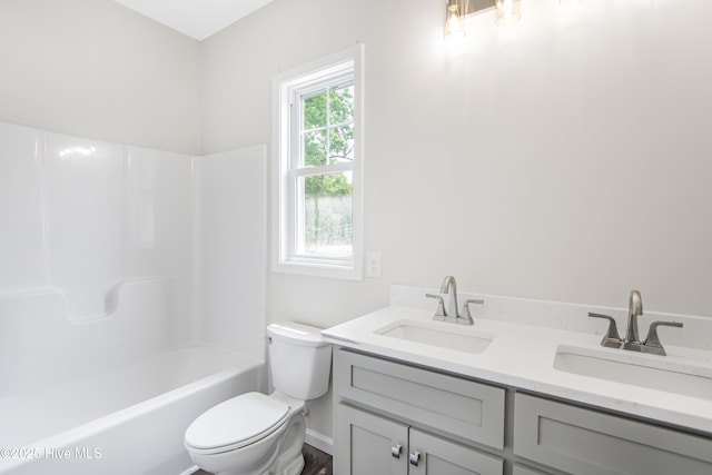 401 Singletary St SE, Wilson, NC 27893 - bathroom with toilet, double vanity, and shower / tub combination