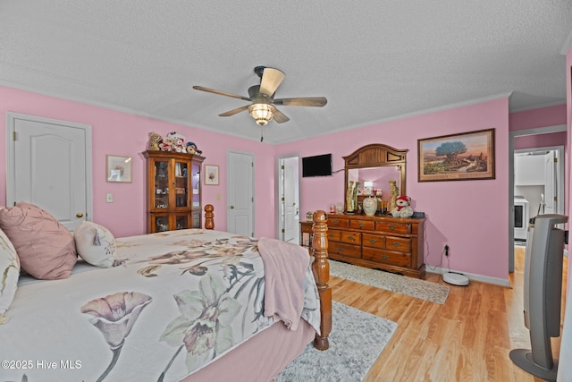 bedroom with light wood-style flooring, a textured ceiling, a ceiling fan, and ornamental molding