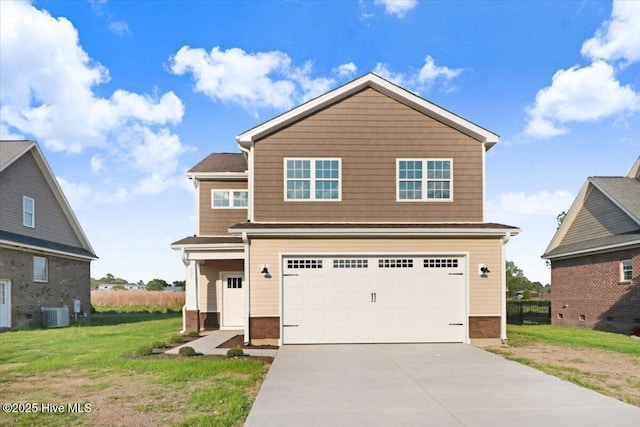 view of front of house featuring a garage, a front lawn, central AC, and driveway