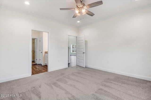 unfurnished bedroom with carpet floors, ornamental molding, baseboards, and recessed lighting