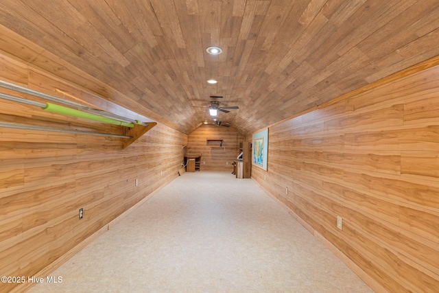 hallway with wooden walls, recessed lighting, vaulted ceiling, and wooden ceiling