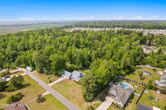 bird's eye view with a forest view