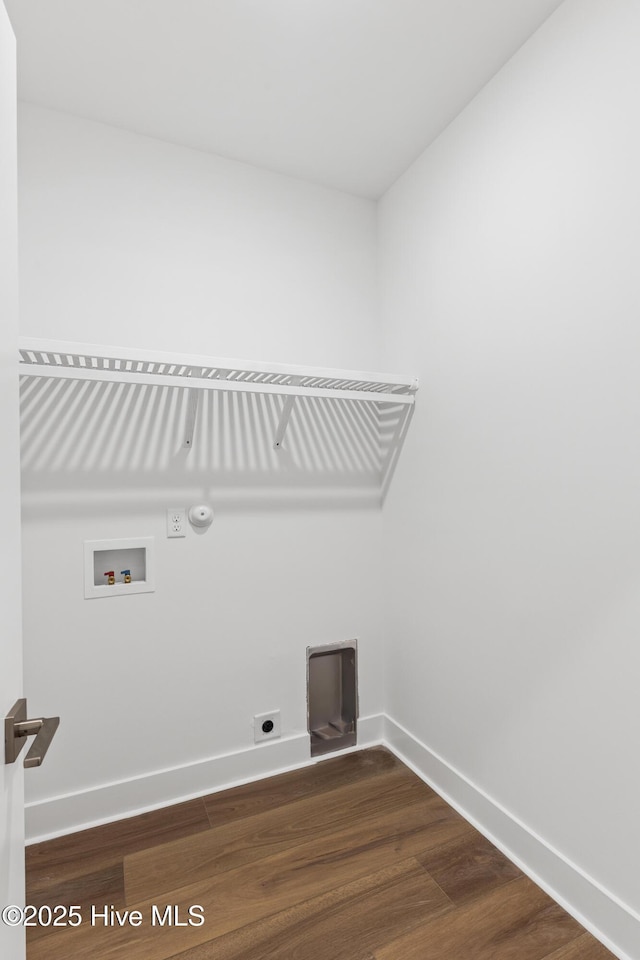 washroom featuring laundry area, hookup for a washing machine, dark wood finished floors, electric dryer hookup, and baseboards