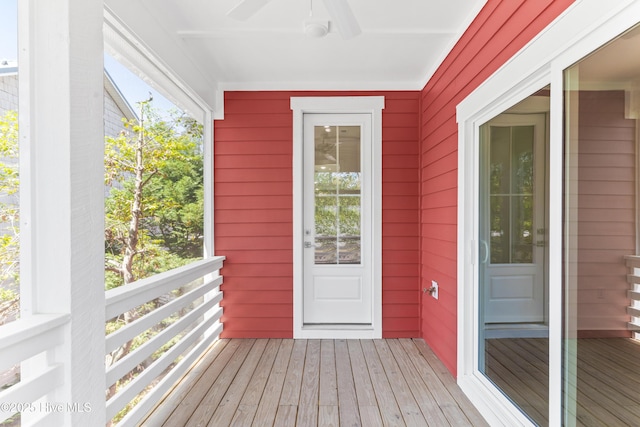 exterior space with a ceiling fan