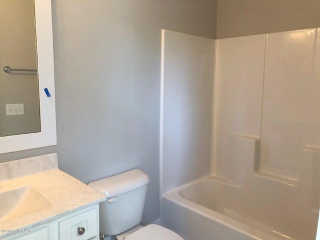 4006 Tamarisk Ln, Wilmington, NC 28409 - bathroom with vanity, washtub / shower combination, and toilet