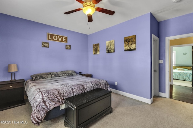 bedroom featuring carpet floors, baseboards, and ceiling fan