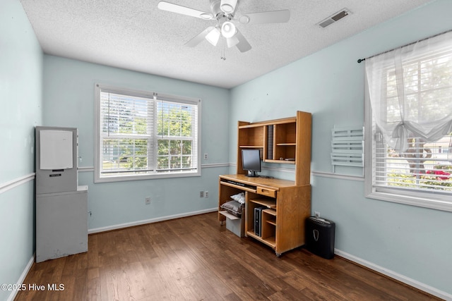 107 Palmetta Dr, Newport, NC 28570 - office area with visible vents, dark wood-style flooring, baseboards, a textured ceiling, and a ceiling fan