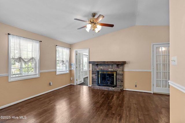 107 Palmetta Dr, Newport, NC 28570 - unfurnished living room with wood finished floors, a ceiling fan, a glass covered fireplace, and lofted ceiling