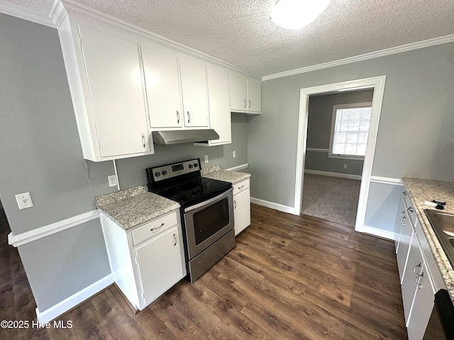 kitchen featuring crown molding, a textured ceiling, under cabinet range hood, and stainless steel range with electric cooktop
