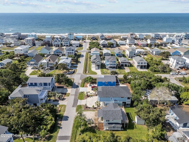aerial view featuring a water view and a residential view