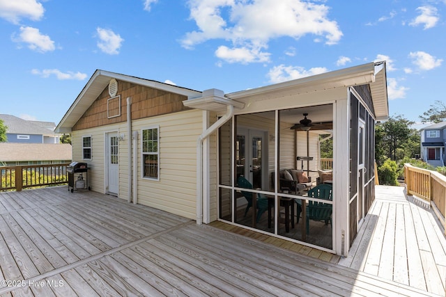 wooden deck featuring grilling area