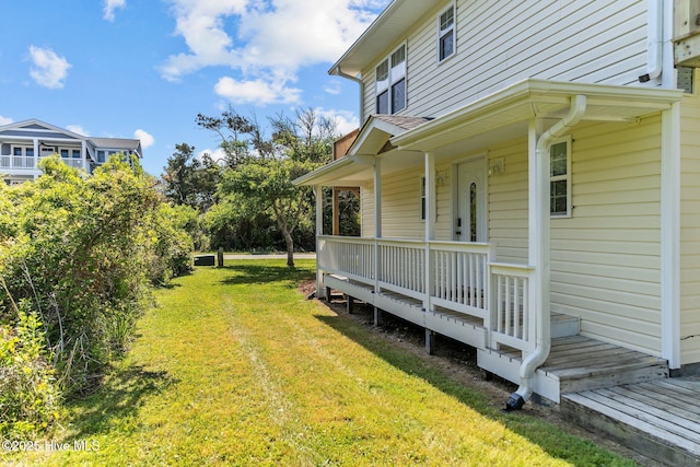 view of yard featuring a porch
